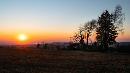 Colorful sunset in the Krkonoše foothills, Czech Republic.