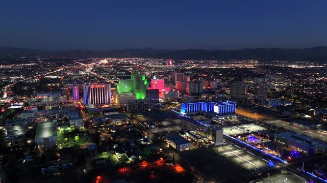 Reno Nevada - Downtown Reno Skyline Aerial Reverse at Dusk / Blue Hour