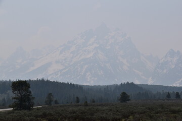 Beautiful landscapes covered in thick smoke from forest fires at Grand Teton National Park, Wyoming