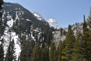 Hiking in the stunning mountain and lake scenery in the Grand Teton National Park, Wyoming