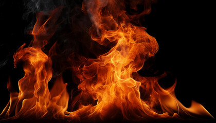 Fototapeta premium A dramatic display of bright orange and red flames leaping against a black background. 