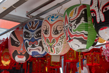 Fototapeta premium Colored Characterized Chinese Lamps in Front Of A Shop In Singapore