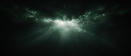 Fototapeta premium Dark and mysterious background with a bright light shining through the center.