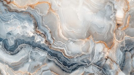 Elegant blue and gray marbled texture with golden veins showcasing fluid patterns and organic movement in design