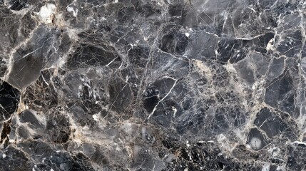 Obraz premium Elegant black marble surface with white veining showcasing natural beauty and texture in a modern design setting