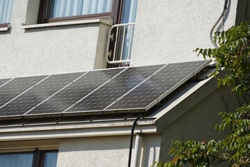 A balcony power plant installed on a bay window roof