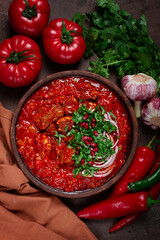 Chashushuli, a traditional Georgian dish, spicy, stewed meat with tomatoes and spices, homemade, no people,