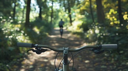 Close-up of a mountain bike in a park. man riding on forest trails.
