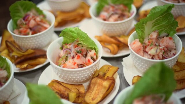many white plates with ceviche at a holiday banquet