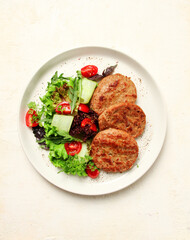 fried cutlets, minced beef, with vegetable salad, top view, no people,