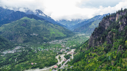 Aerial view of mountains and valleys of manali and beas river near Jogini waterfall in Himachal Pradesh India.