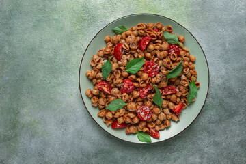 Tuscan pasta with smoked paprika and basil,parmesan cheese, Italian traditional cuisine,