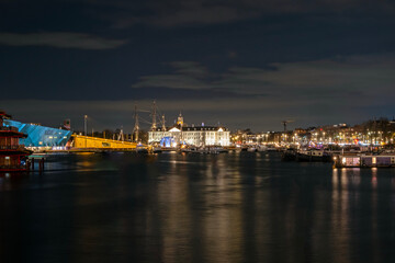 Amsterdam by night with the maritime museum  in the Netherlands