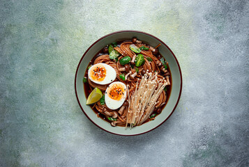 soba, buckwheat noodles, with enoki mushrooms, shimeji and boiled egg, top view, homemade, no people,