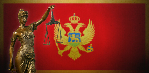 Lady Justice before a Montenegro flag