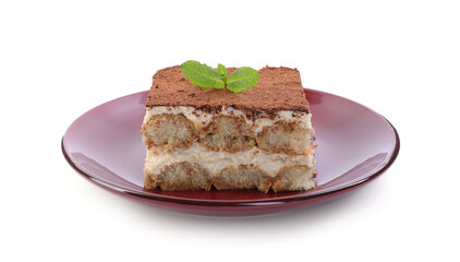Delicious tiramisu with mint isolated on white