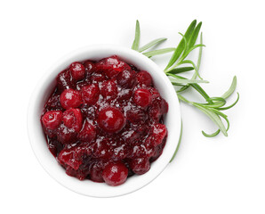 Tasty cranberry sauce in bowl and rosemary isolated on white, top view