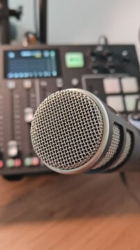 studio work with rode microphone and mixer