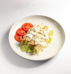 Flautas con queso y crema