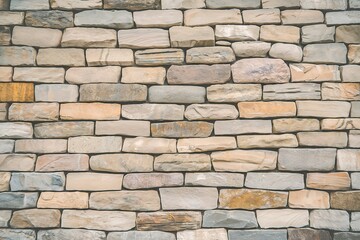 Obraz premium A close-up view of a wall constructed from irregularly shaped stones