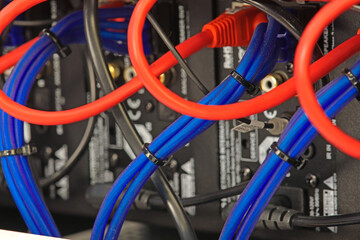 Connection of electronic modules in a multimedia telecommunication rack. Soft focus. 
