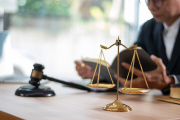 Judge's gavel on table in lawyer's office and