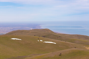 Obraz premium Outline of the Caspian Sea coast from the mountains.