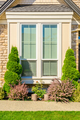 Fragment of  luxury house in summer with green trees and nice landscape in Vancouver, Canada, North America. Day time on June 2024