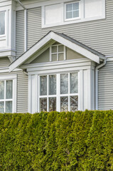 Fragment of  luxury house in summer with green trees and nice landscape in Vancouver, Canada, North America. Day time on June 2024
