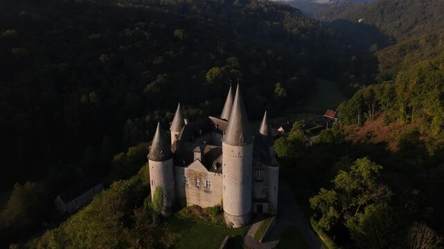 Explore the Enchanting Veves Castle Surrounded by Lush Greenery
