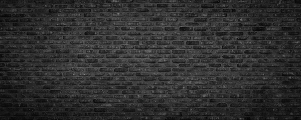 dark brick wall, black masonry of a burnt building