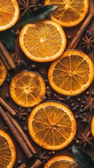 A flat lay of dried orange slices, cinnamon sticks, and spices, evoking warmth and flavor.