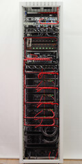 Telecommunication rack with Internet equipment, multimedia amplifiers, video surveillance system....