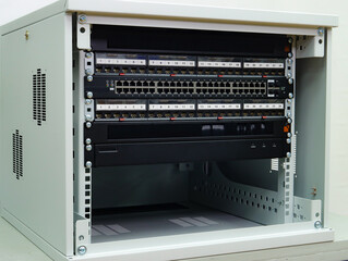 Telecommunication rack with Internet equipment, multimedia amplifiers, video surveillance system....