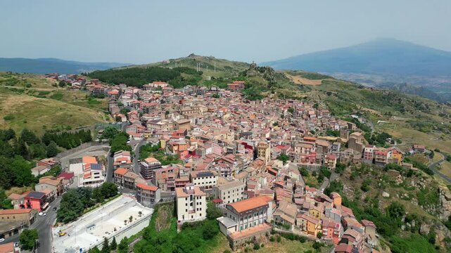 View of the city of Cesaro with Mount Etna in the background. 4k