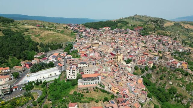 View of the city of Cesaro with Mount Etna in the background. 4k
