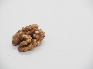 Walnuts on white background, raw food
