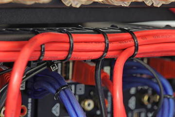 Connection of electronic modules in a multimedia telecommunication rack. Soft focus. 