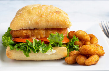  fish fillet sandwich,  with shrimp poppers