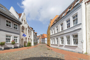 Obraz premium City walk in Schleswig with many beautiful buildings