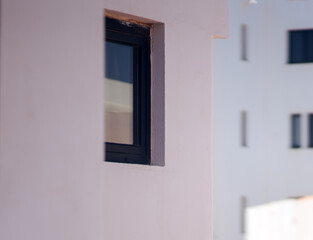 A modern white houses in a small town closeup in a daylight.
