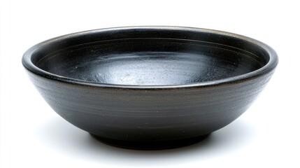 Elegant black salad bowl on a pristine white background showcasing its smooth texture and classic design for culinary presentations.