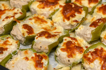 Delicious stuffed peppers filled with savory chicken and melted cheese
