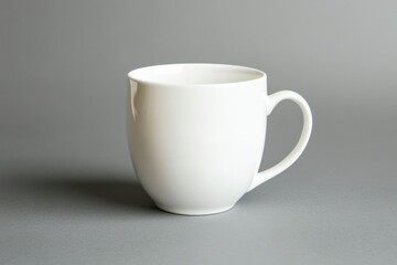 Fototapeta premium Minimalist White Coffee Mug on Gray Background