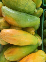 A LOT OF PAPAYAS IN THE SUPERMARKET