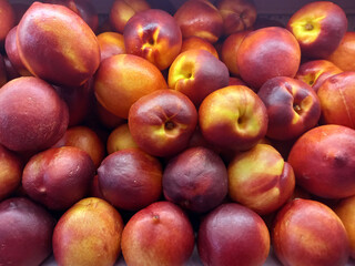 LOTS OF NECTARINES IN THE SUPERMARKET