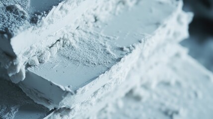 Close-up of aerated concrete blocks with a uniform layer of adhesive mortar applied for wall construction and bricklaying techniques.