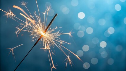 Obraz premium Sparkle Light Trails Blue Bokeh Background, Close-up, Festive Concept, Firework, Celebration Fireworks,Sparklers