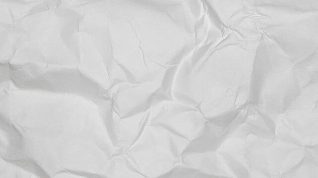 White crumpled and wrinkled paper texture background, stop motion footage 4K
