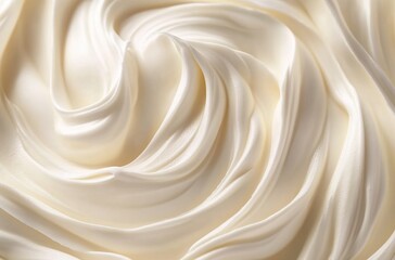 A close-up of creamy white frosting swirls, symbolizing the luscious texture and creamy nature of natural cream cheese spread. 